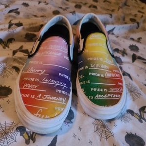 Vans Pride Rainbow and white skate slip ons.